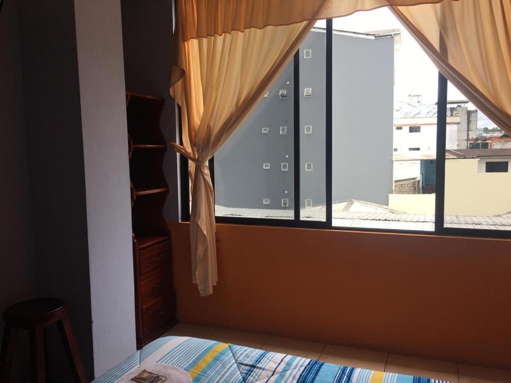 Quédate Aquí Macas Esterno foto