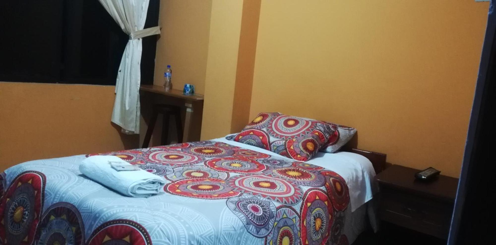 Quédate Aquí Macas Esterno foto