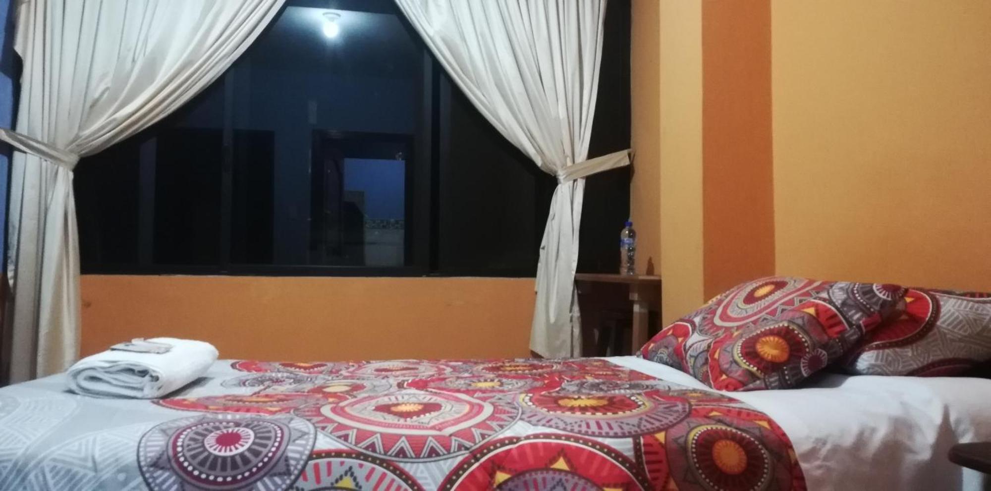 Quédate Aquí Macas Esterno foto
